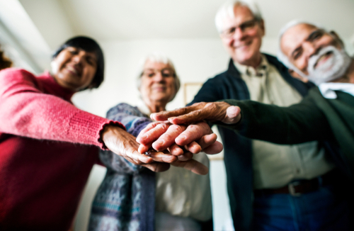 Senior Friends Socializing - Assisted Living Helps Overcome Loneliness 